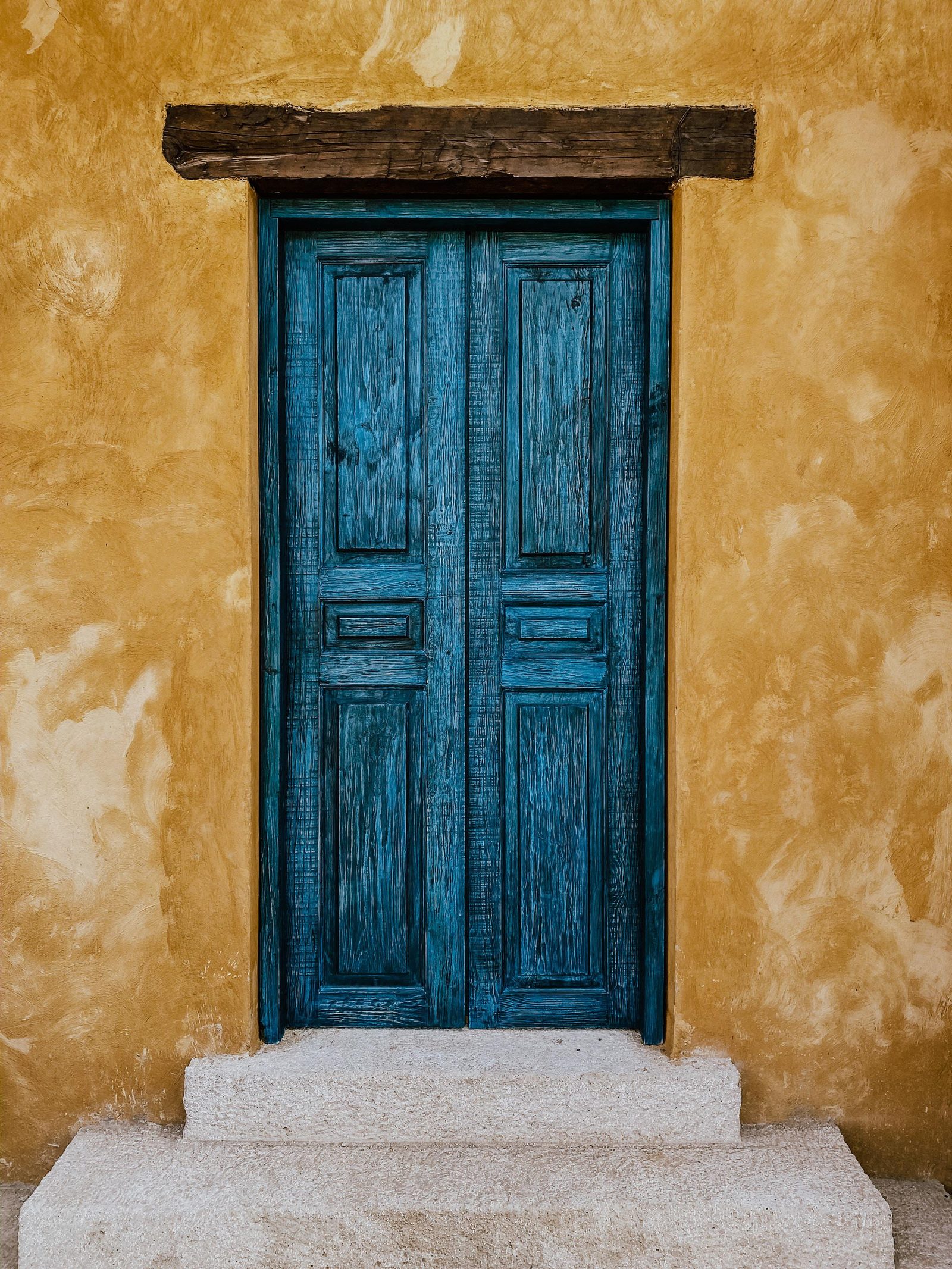 The Reason For Blister, Peeling, and Fading Of Exterior Doors Painted a Dark Color